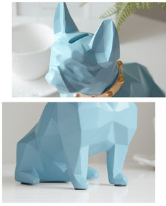 Image of a super-cute French Bulldog statue in a close view which is also a piggy bank in sky blue color