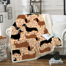Load image into Gallery viewer, Image of a weiner dog blanket with tan and black and tan dachshunds