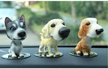 Load image into Gallery viewer, Image of three bobbleheads on a car dashboard shaped like a Husky, Labrador, and Basset Hound