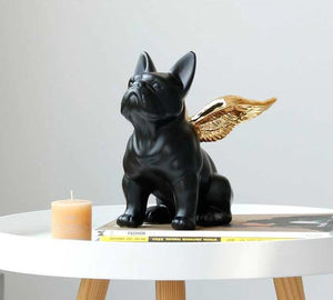 Image of a black frenchie statue with Golden Angel Wings, made of black ceramic, with gold-plated angel wings