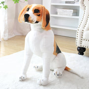 image of a woman playing with an adorable beagle stuffed animal plush toy