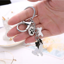 Load image into Gallery viewer, Image of a super cute Papillon keychain in the shape of the beautiful standing Papillon design