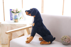 image of a rottweiler stuffed animal plush toy - sideview