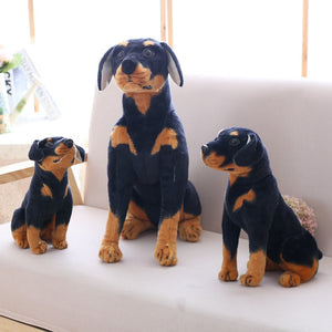 image of three rottweiler stuffed animal plush toys