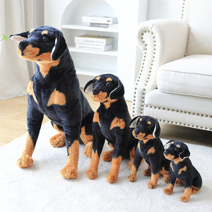 image of a collection of rottweiler stuffed animal plush toys