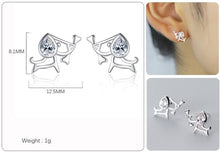 Load image into Gallery viewer, Image of Beagle earrings made of silver size