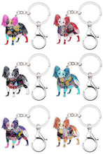 Load image into Gallery viewer, Image of six Papillon keychains made of enamel in different colors