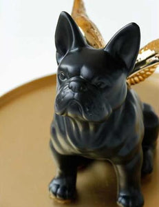 Image of a black french bulldog statue with gold-plated angel wings