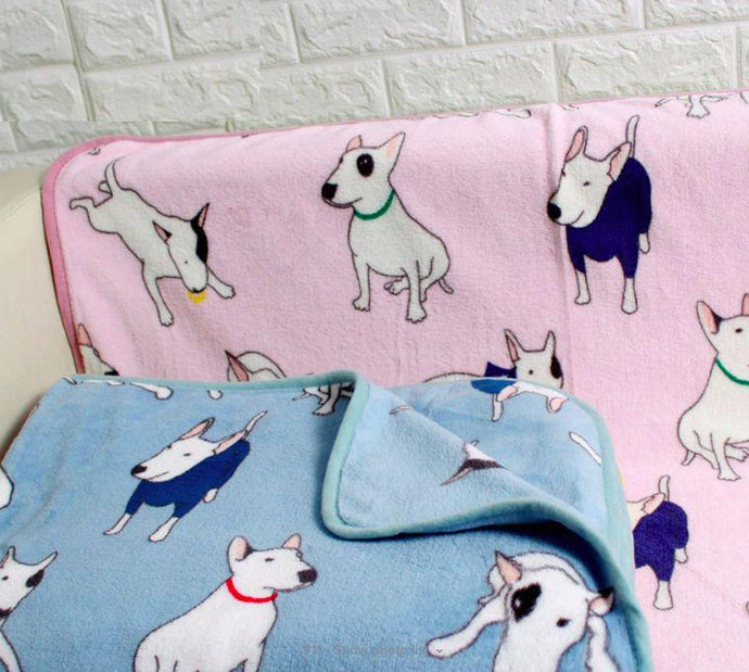 Image of two bull terrier blankets in the color pink and blue, made of super-soft coral fleece fabric