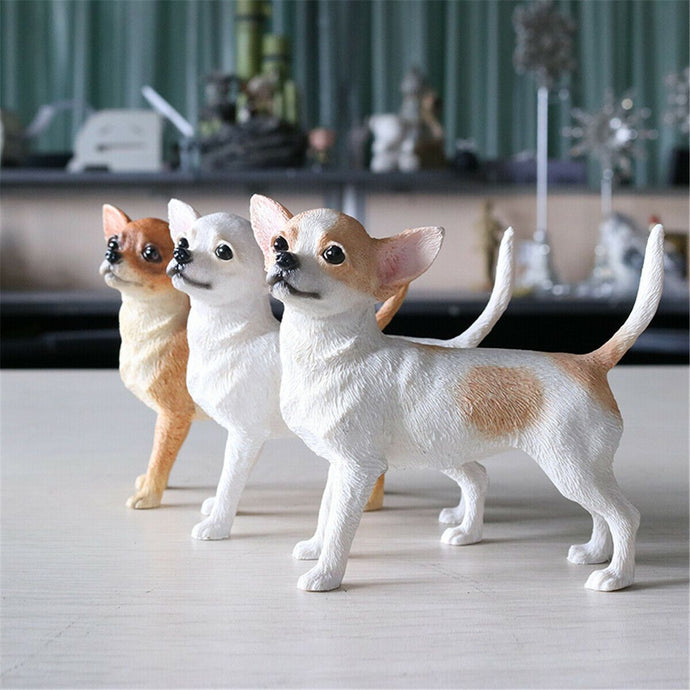 Image of three standing Chihuahua figurines in three classic Chihuahua colors including Fawn, White, and Gold & White.