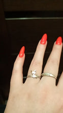 Load image into Gallery viewer, Image of a lady wearing a gold Chihuahua ring with red nailpolish
