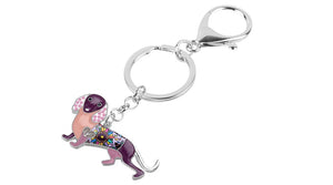 Close up image of a dachshund keychain in the color purple