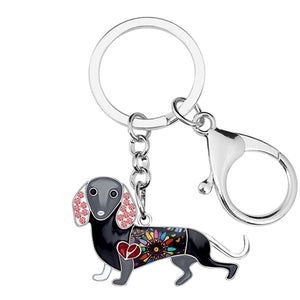 Image of a grey color enamel dachshund keychain