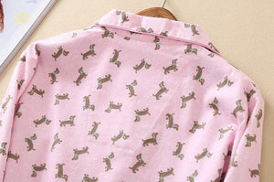 Image of a pink color Dachshund Pajama set shirt's close back view with an infinite dachshund print design