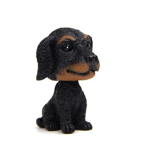 Image of a Dachshund bobblehead for car