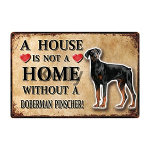 Image of a Doberman Sign board with a text 'A House Is Not A Home Without A Doberman Pinscher'