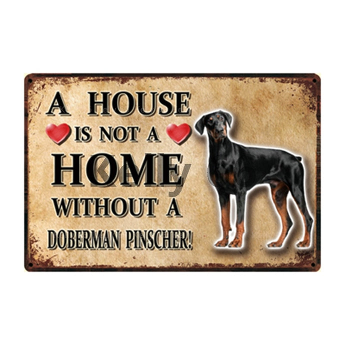 Image of a Doberman Signboard with a text 'A House Is Not A Home Without A Doberman Pinscher'