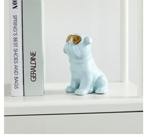 Image of an english bulldog statue in the color light blue