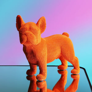 Image of a textured french bulldog statue in the color orange