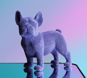 Image of a textured french bulldog statue made of resin in the color blue