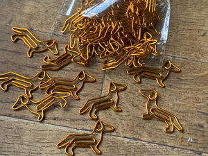image of dachshund paperclips packet opening