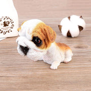 Image of a English Bulldog bobblehead sitting on the floor