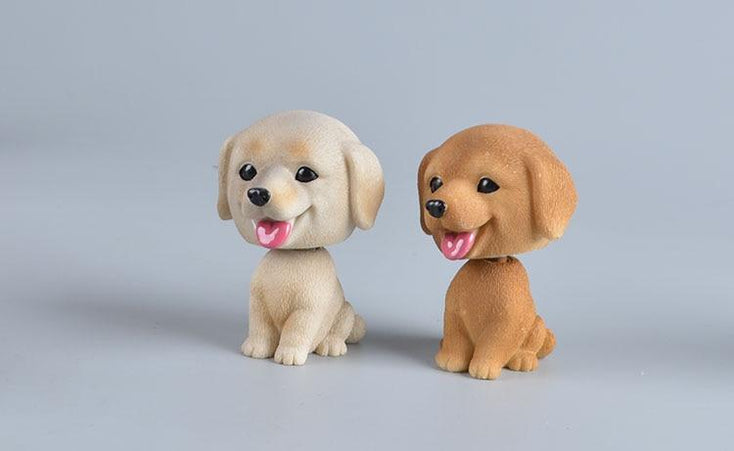Image of a smiling Yellow Labrador and Golden Retriever bobblehead