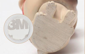 Image of a nodding girl Pug bobblehead paw view