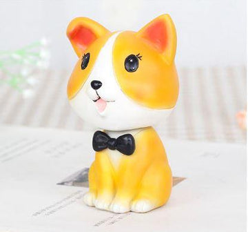 Image of a nodding Corgi bobblehead