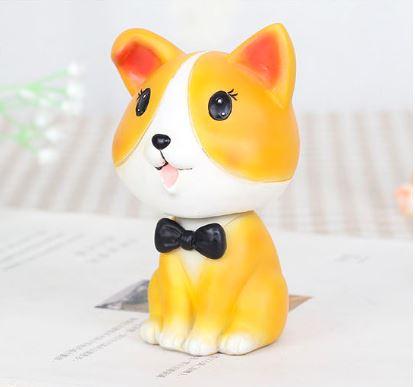 Image of a nodding Corgi bobblehead