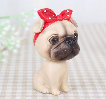 Image of a nodding girl Pug bobblehead