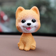 Load image into Gallery viewer, Image of a pomeranian bobblehead in the color orange