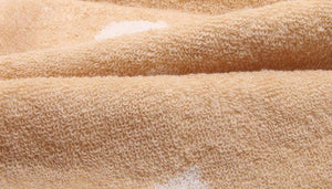 Close image of pug towel in brown color