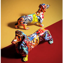 Load image into Gallery viewer, image of two dachshund dog statues