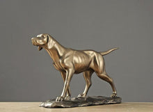 Load image into Gallery viewer, Image of a golden weimaraner statue made of brass and resin