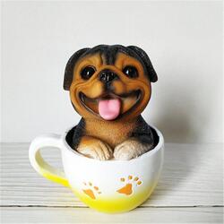 Image of a super cute Rottweiler figurine for Rottweiler dog gift lovers