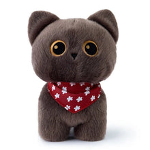 Load image into Gallery viewer, A small brown plush cat toy with large round yellow eyes and a red bandana with white floral patterns, centered on a light gray background.