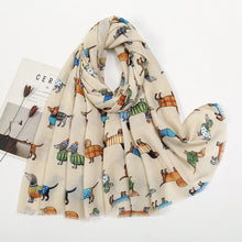 Load image into Gallery viewer, Beige scarf with colorful dog pattern on a white background