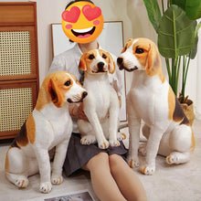 Load image into Gallery viewer, Three plush beagle dog plush toys are arranged around a seated person in a white shirt and gray skirt in a bright indoor room. The person has a heart-eyes emoji face overlay.