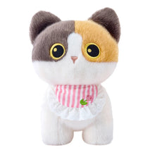 Load image into Gallery viewer, A plush toy cat with a tri-color calico pattern of white, brown, and orange, wearing a pink and white striped bib with a white lace ruffle collar, set against a plain white background.
