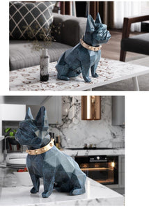 Image of a collage of two super-cute French Bulldog statues which is also a piggy bank in texture blue color, placed on a table