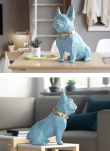 Image of a collage of two super-cute French Bulldog statues which is also a piggy bank in sky blue color, placed on a table