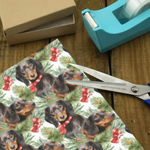 Load image into Gallery viewer, Black and Tan Dachshund Jolly Christmas Gift Wrapping Paper - 2 Rolls-4