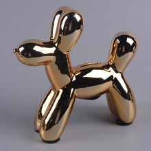 Load image into Gallery viewer, Image of a beautiful Poodle piggy bank statue in the color Gold, made of ceramic