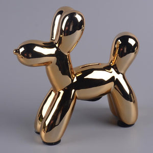 Image of a beautiful Poodle piggy bank statue in the color Gold, made of ceramic