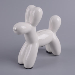 Image of a beautiful Poodle piggy bank statue in the color White, made of ceramic