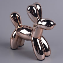 Load image into Gallery viewer, Image of a beautiful Poodle piggy bank statue in the color Rose Gold, made of ceramic