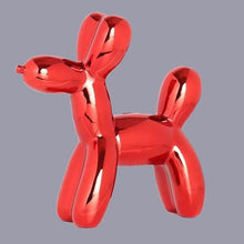Load image into Gallery viewer, Image of a beautiful Poodle piggy bank statue in the color Red, made of ceramic