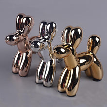 Load image into Gallery viewer, Image of three Poodle piggy bank statues in the color Gold, Silver, and Rose Gold, made of ceramic