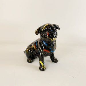 Front image of sitting black pug statue
